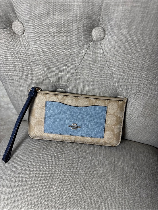 Coach Handbags - Coach Beige Signature Wristlet with Light Blue Pocket